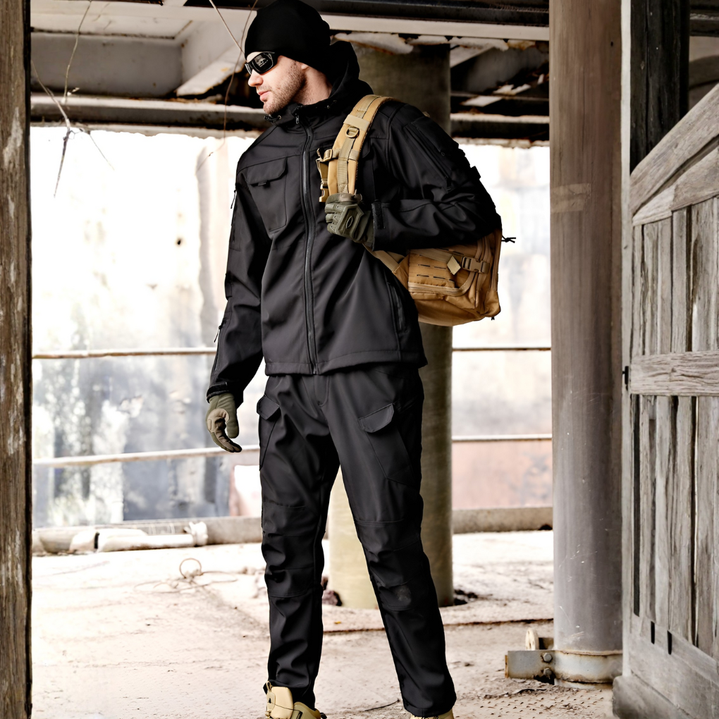 Versatile men's outdoor softshell jacket in dark green, paired with gray weather-resistant activewear pants.