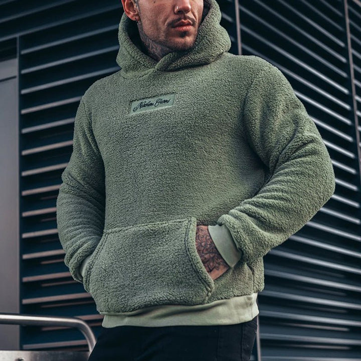 Men's ultra-warm relaxed fit pullover hoodie, perfect for cozy winter wear & casual style.