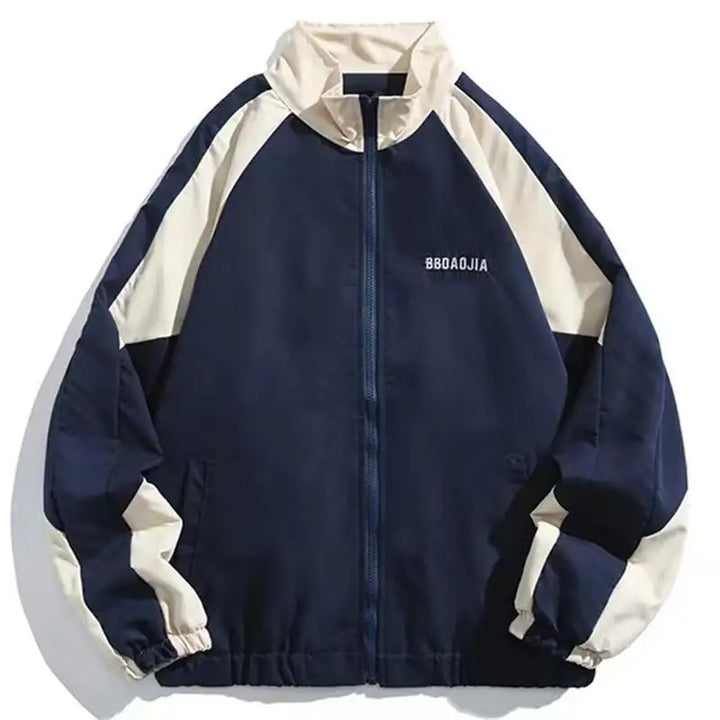 Lightweight men's urban color block windbreaker jacket. Weather-resistant outerwear perfect for casual spring & fall style.