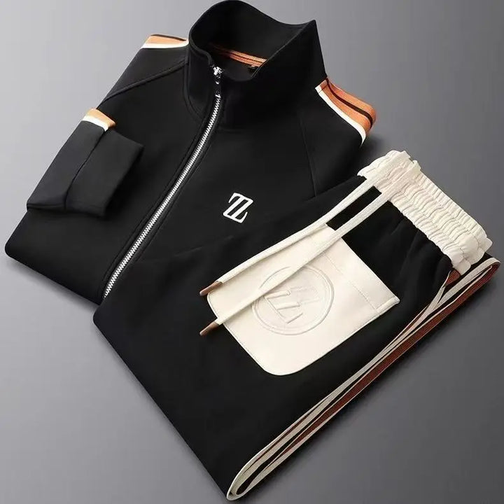 Comfortable men's two-piece tracksuit: full zip jacket & joggers, ideal for travel or everyday wear.