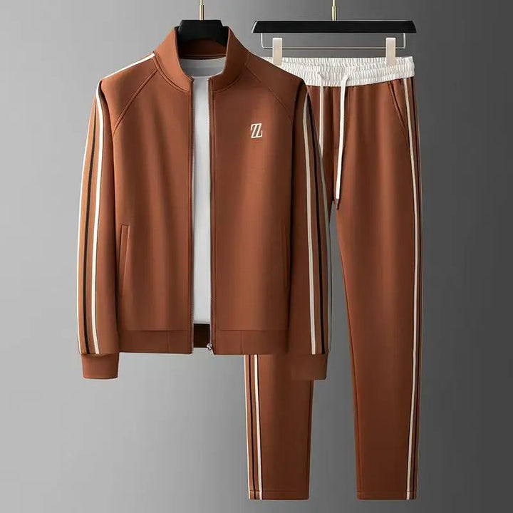 Stylish men's urban tracksuit set. Full zip jacket and joggers perfect for streetwear fashion.