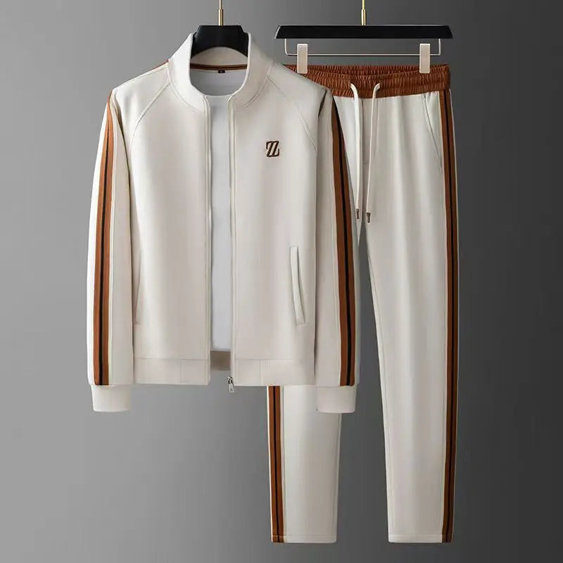 Men's full zip jacket and matching joggers. Two-piece tracksuit for athletic, casual & travel outfits.