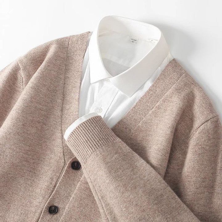 Men's V-neck button-down cardigan sweater for versatile fall & winter layering. Stylish long sleeve knit.
