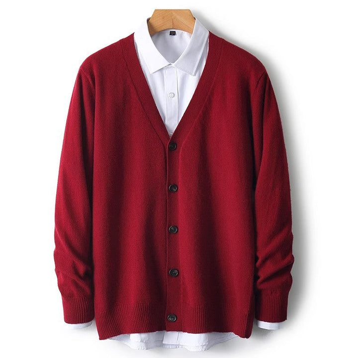 Fashionable men's knit cardigan sweater, V-neck, button-down design. Ideal for comfortable fall layering.