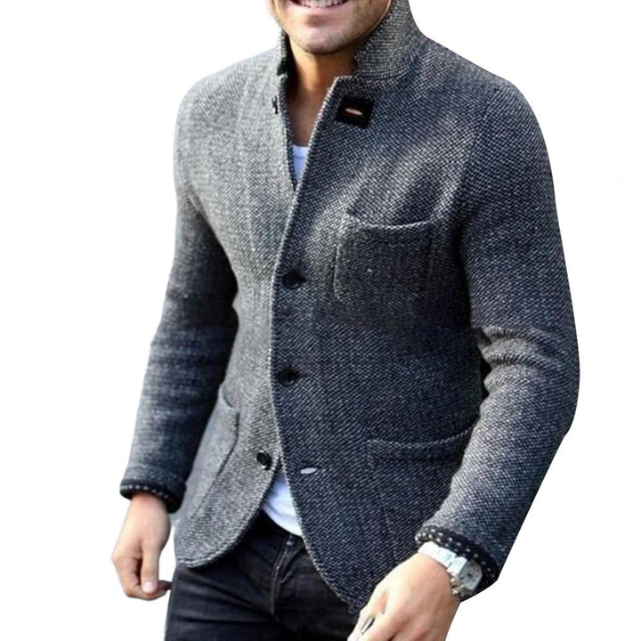 Man wearing a versatile black button-down casual jacket, ideal everyday outerwear style.