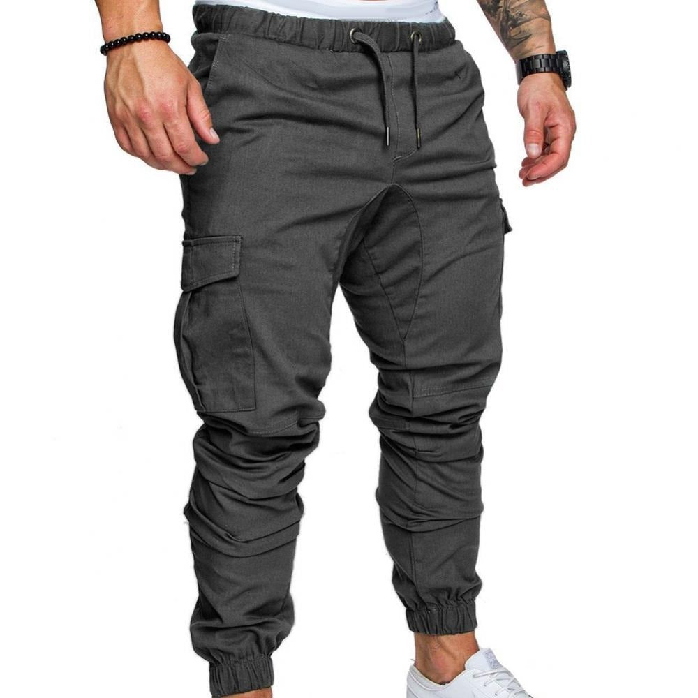 Man wearing versatile men's cargo pants, showcasing comfort & modern style for active everyday adventures.
