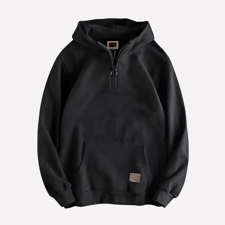 Versatile men's half-zip hoodie for everyday comfort. Pullover style, long sleeves, and hood for layering.