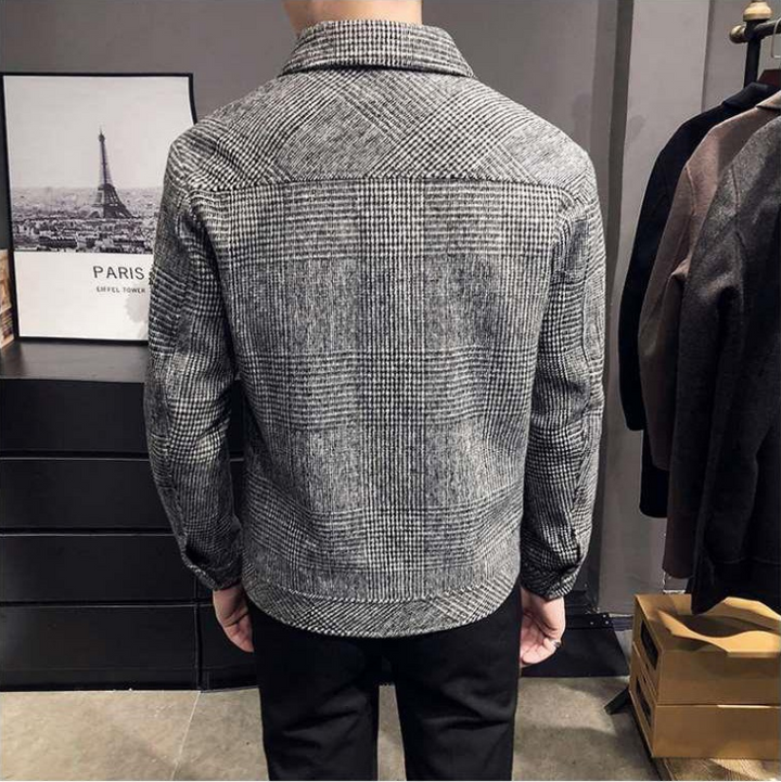 Fashionable men's plaid shirt jacket. A versatile button-up outerwear piece for a modern, casual look.