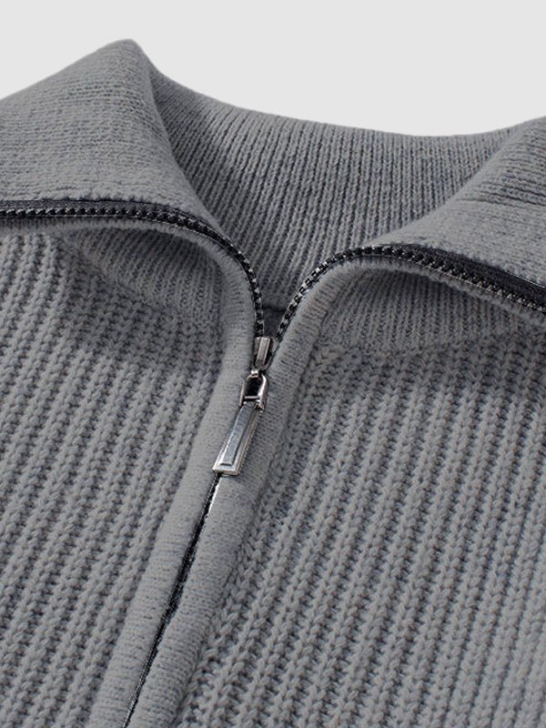 Stylish long sleeve men's quarter zip knit sweater, perfect for casual or dressed-up occasions.