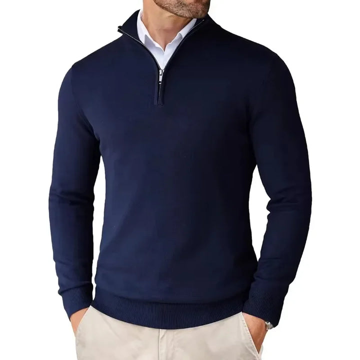 Man wearing a stylish quarter-zip long sleeve sweater, great for versatile daily wear.