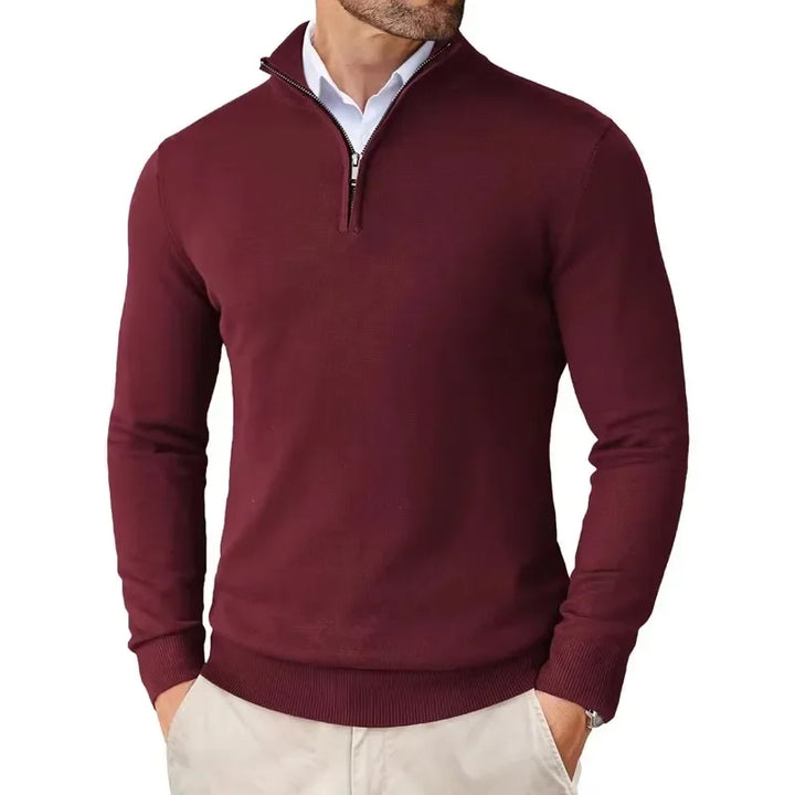 Close-up of a men's quarter-zip sweater, showcasing comfortable texture for layering & style.