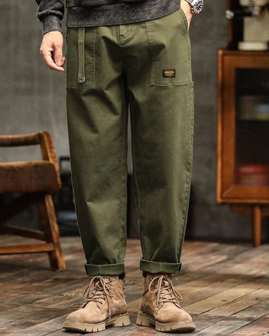 Men's vintage cotton cargo pants in khaki, relaxed fit, side pockets, casual utility style.