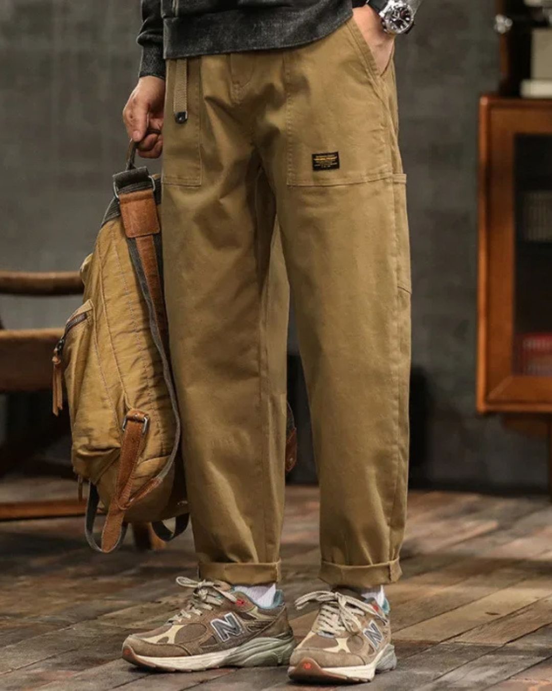 Khaki men's cargo pants, cotton twill, vintage style, utility pockets, comfortable fit.