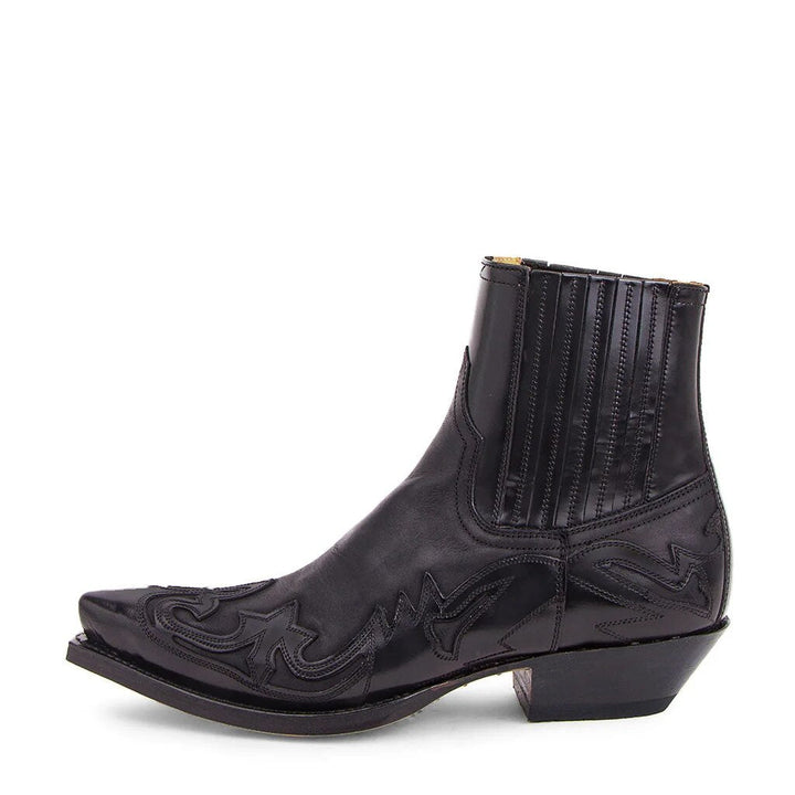 Pair of men's vintage western boots, made of distressed leather with detailed stitching, capturing a rugged aesthetic.