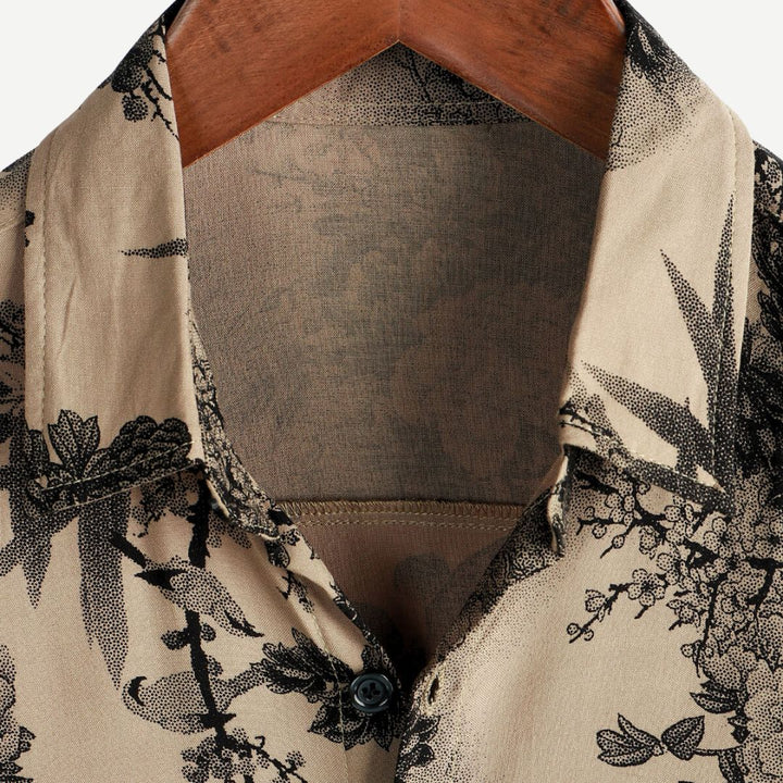 Stylish men's short sleeve shirt with unique vintage blossom floral pattern for a trendy summer look.
