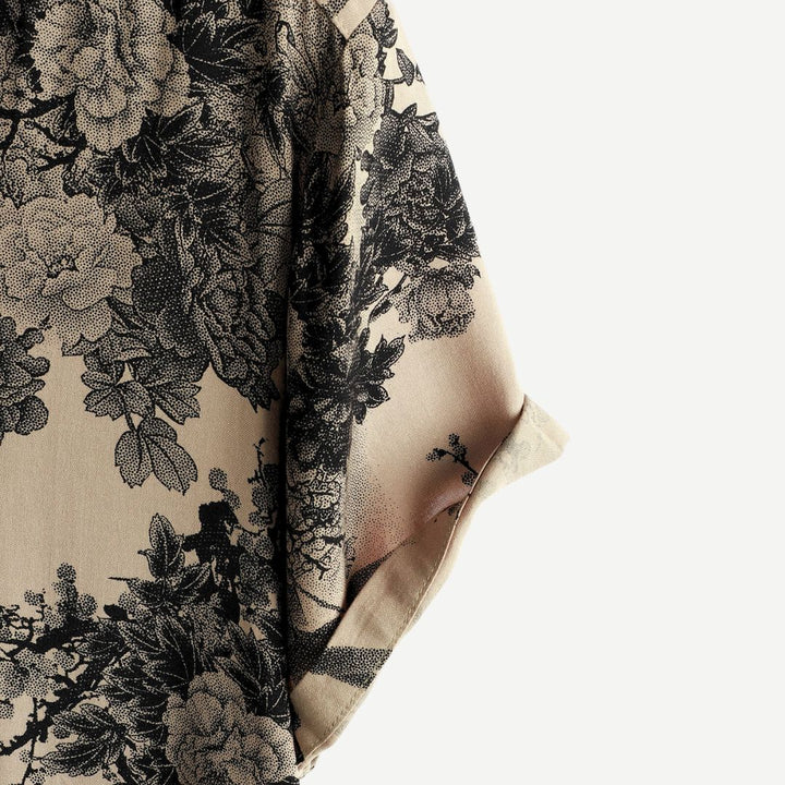 Fashionable men's short sleeve shirt, lightweight and breathable, with a distinctive vintage blossom floral pattern.