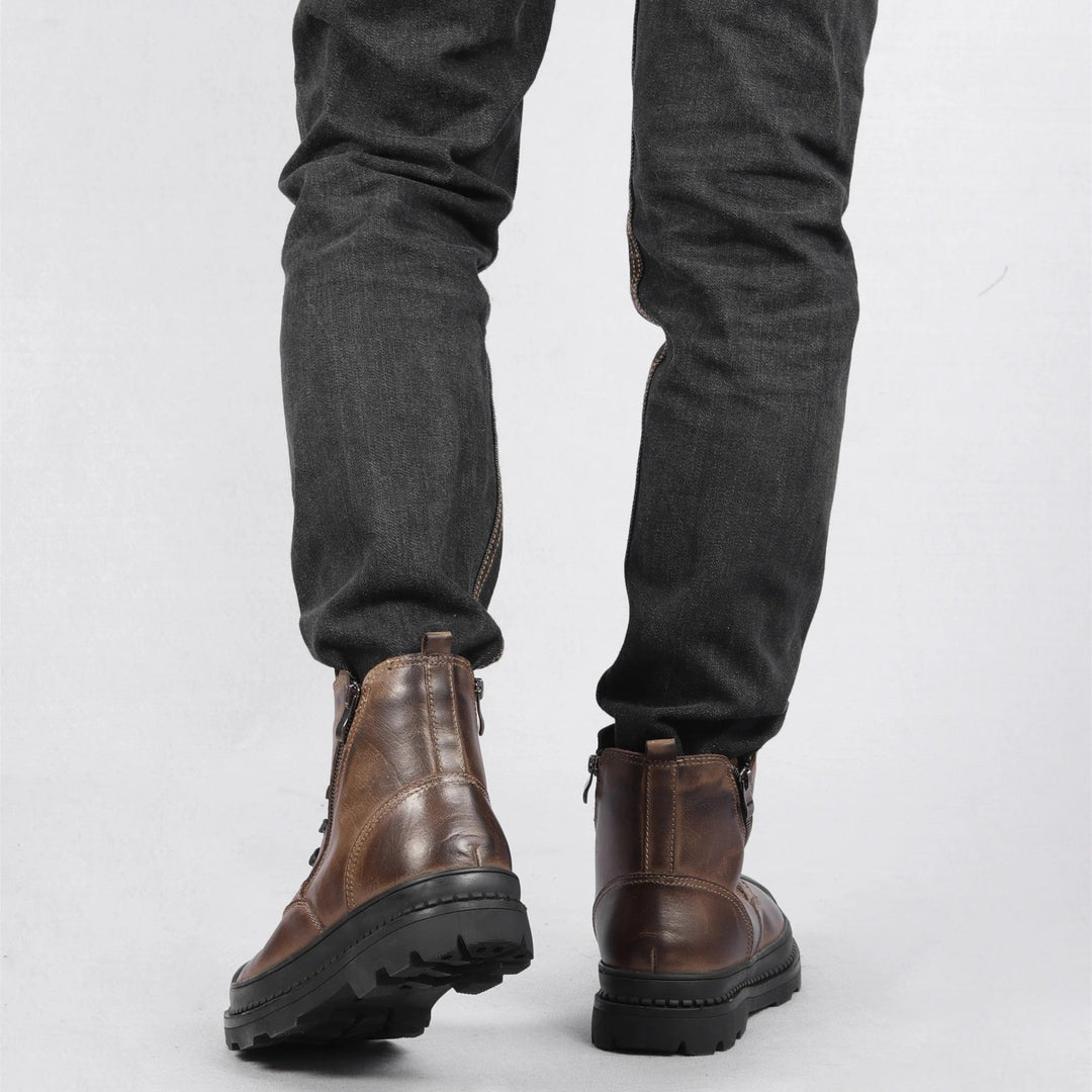 Durable men's vintage ankle boots. Warm leather construction, perfect for cold weather. Zip & lace-up design.