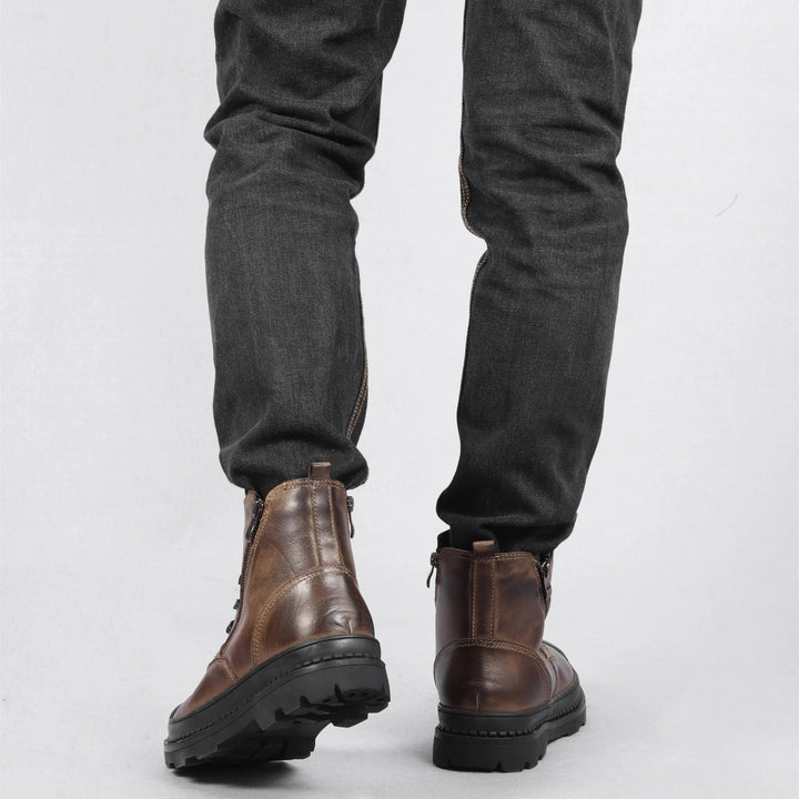 Durable men's vintage ankle boots. Warm leather construction, perfect for cold weather. Zip & lace-up design.
