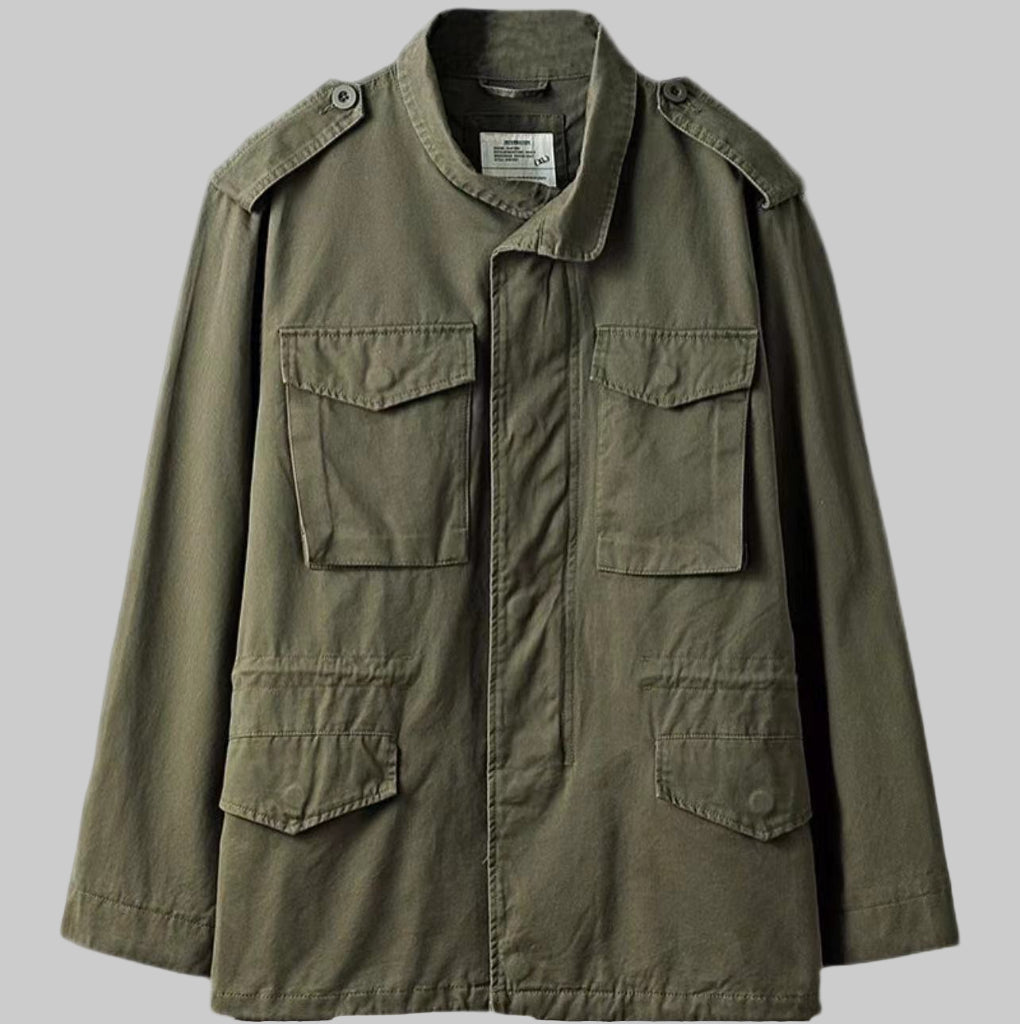 Rugged men's field jacket for casual all-season wear. Vintage military style outerwear with utility and durability.