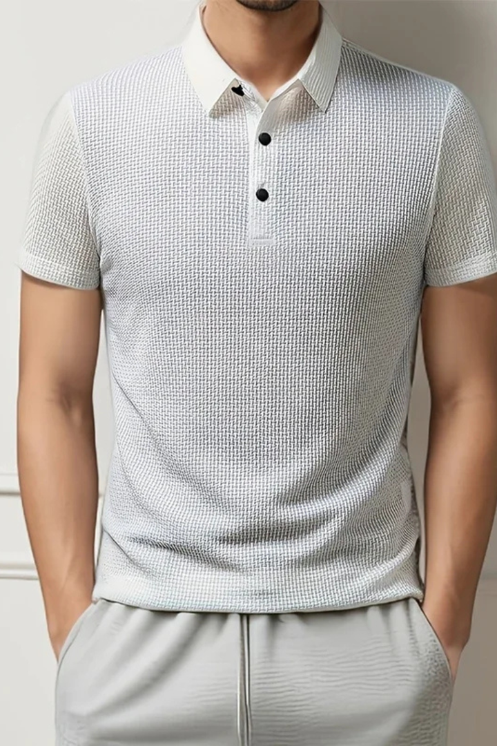 Modern men's fitted polo shirt, short sleeve, waffle knit for a sharp smart casual summer look.