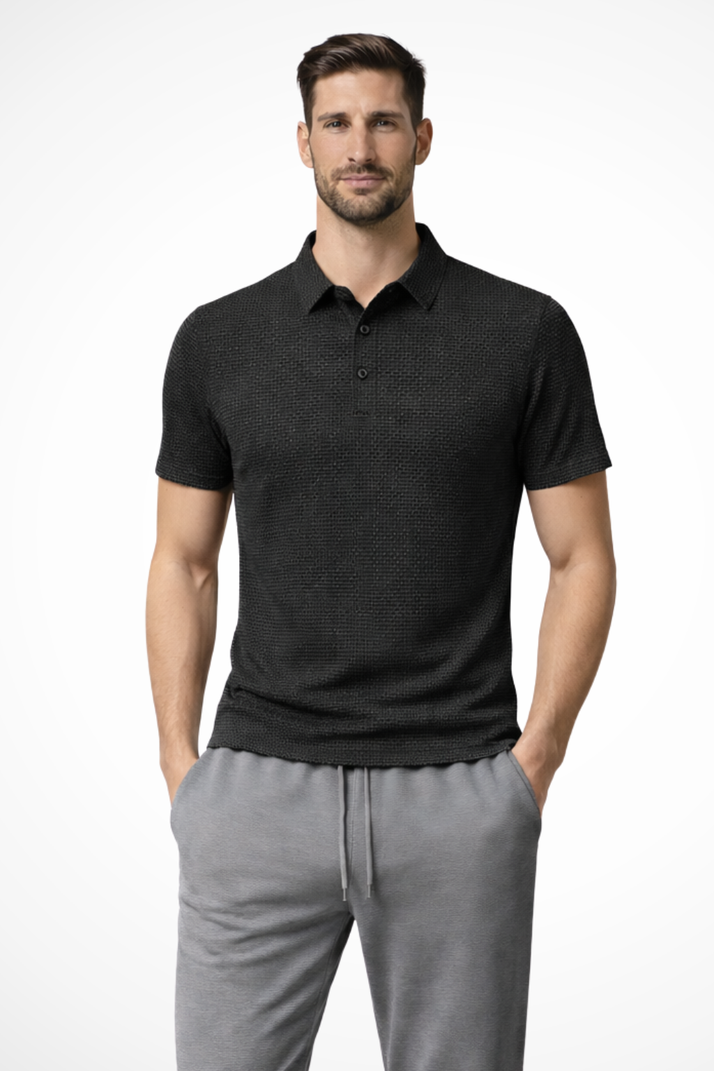 Collared men's short sleeve polo in textured waffle knit fabric, suitable for smart casual fashion.