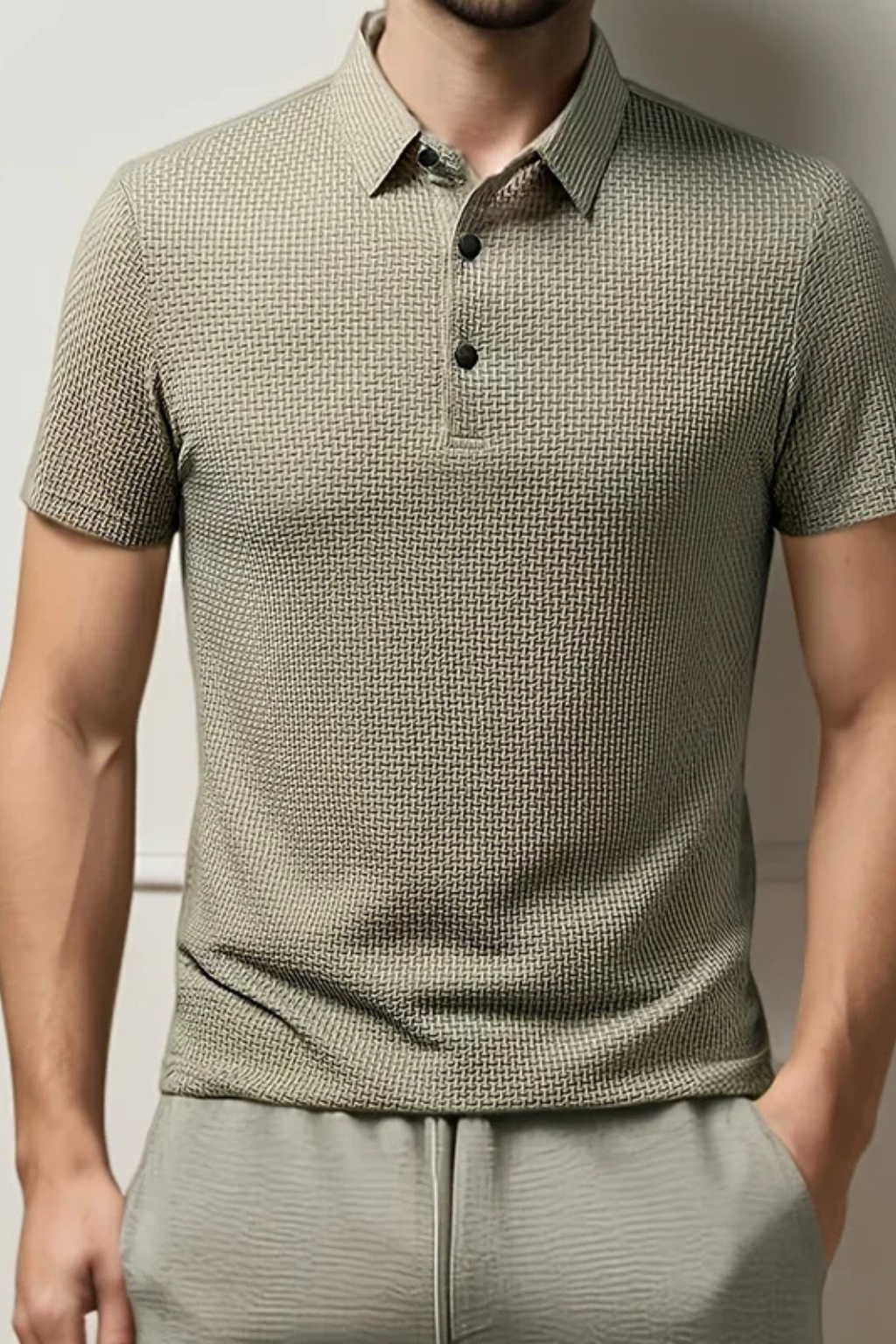 Stylish men's waffle knit short sleeve polo, a formal-casual hybrid for contemporary fashion.