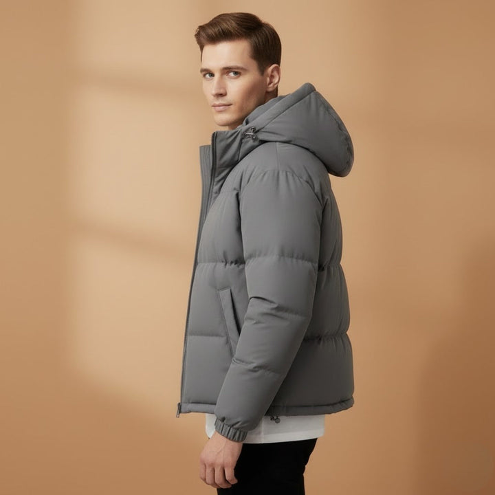 Lightweight men's hooded quilted jacket for versatile daily wear. Perfect warm puffer outerwear for winter.