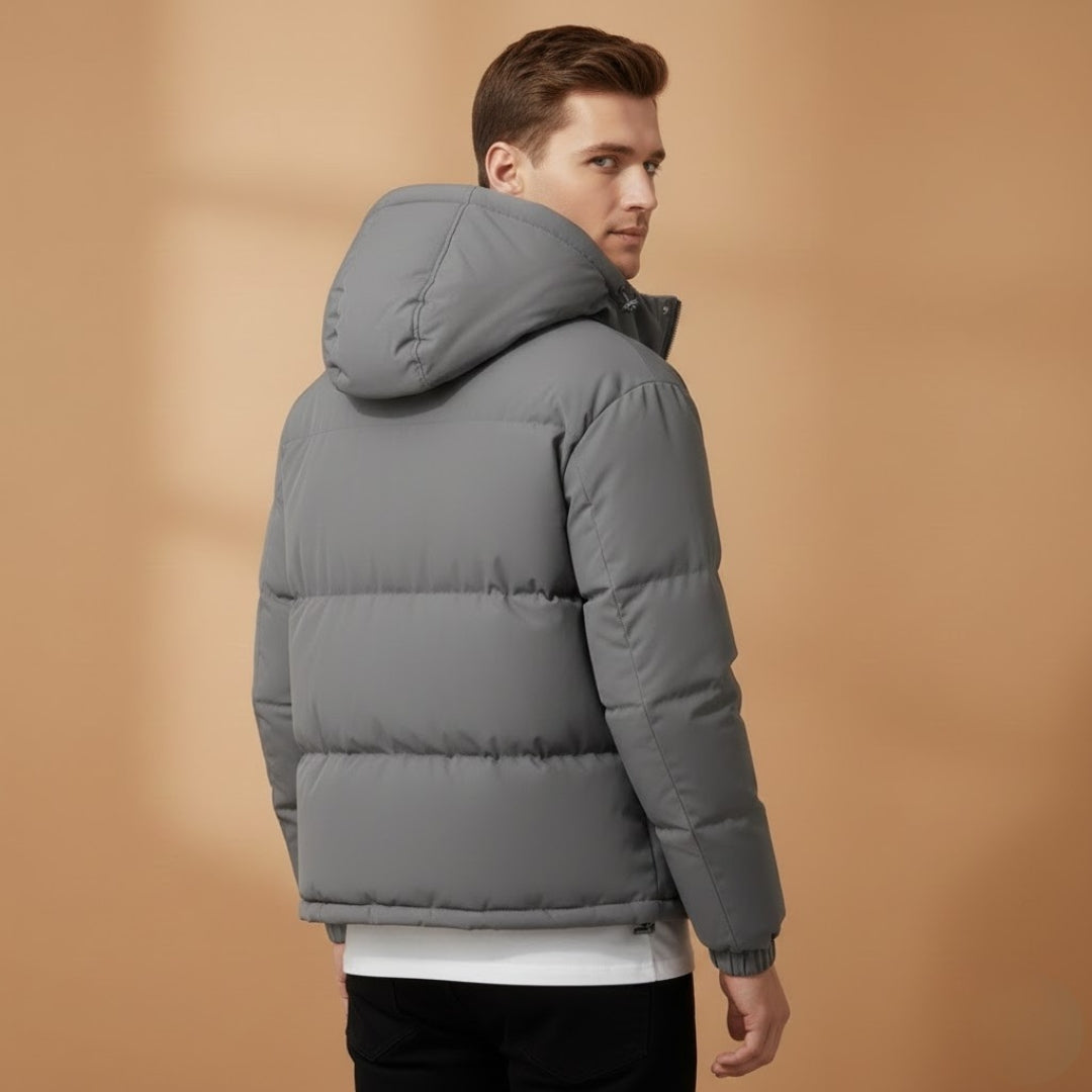 Adventure-ready men's hooded quilted jacket. Warm puffer outerwear for cold weather activities & casual style.