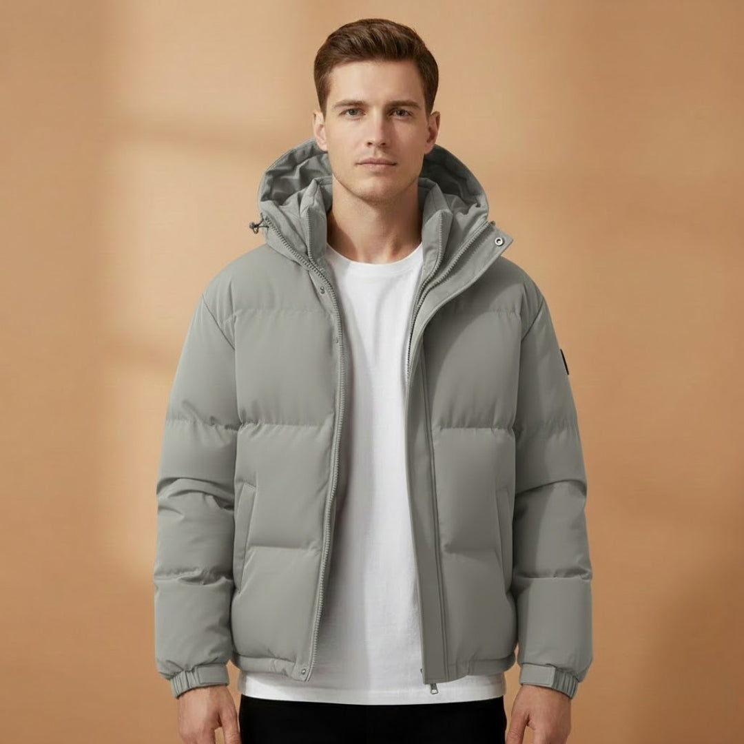 Back view of men's hooded quilted jacket. Warm winter puffer outerwear, perfect for versatile daily style.