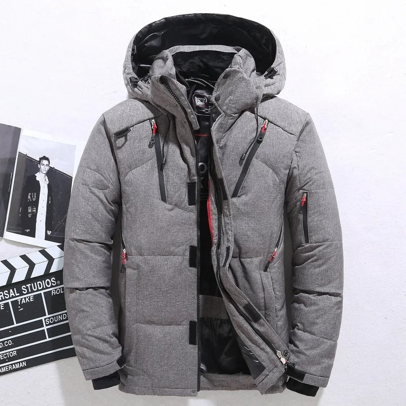 Men's warm puffer winter jacket with hood, ideal for cold weather. Features durable, stylish quilted design.