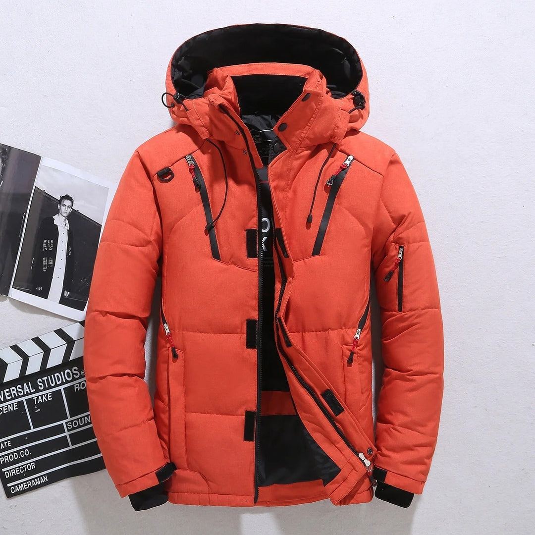 Stylish men's hooded puffer jacket. Quilted, warm winter coat with zip pockets, perfect for outdoor wear & cold.