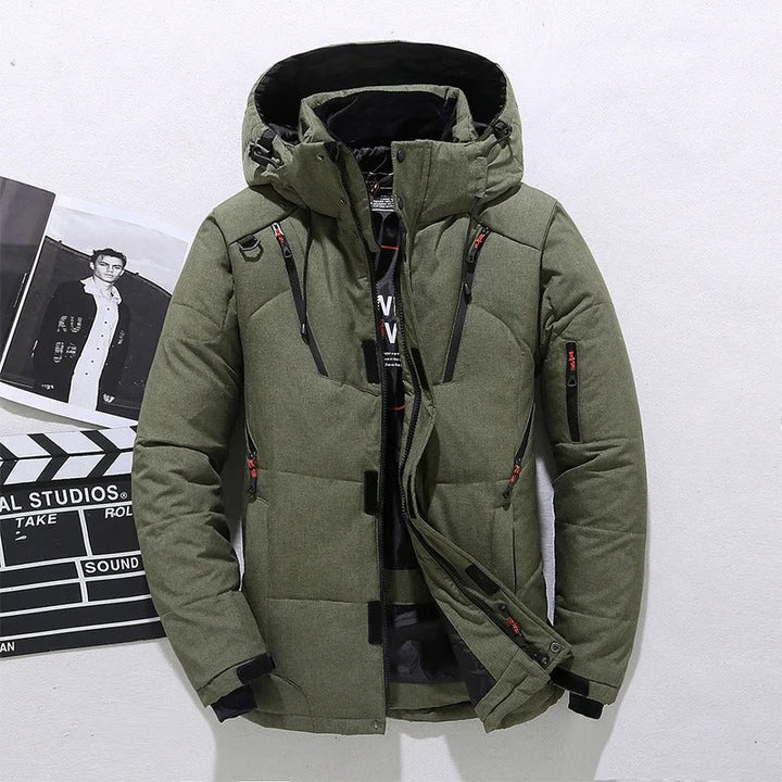 Durable men's puffer winter jacket with hood, essential for cold weather. Provides warmth & protection for outdoor.