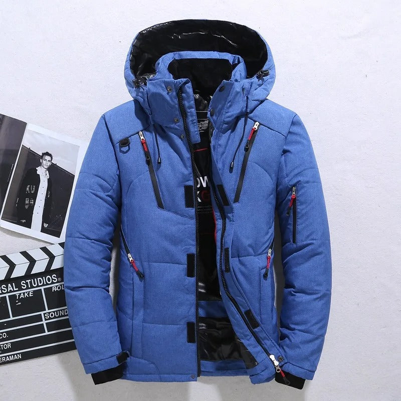 Men's fashionable quilted puffer jacket with hood & zip pockets. A warm winter coat for cold weather & outdoor adventures.