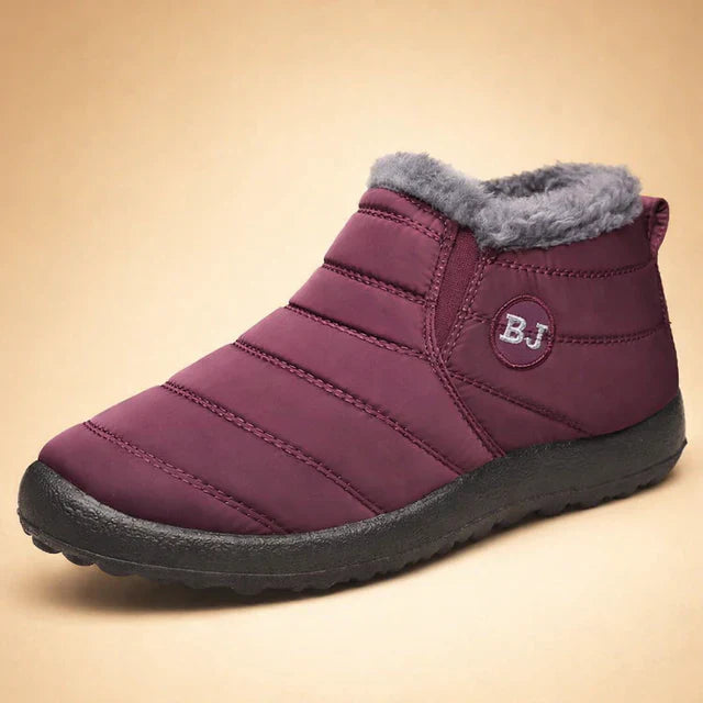Durable men's snow boots, featuring a non-slip sole & warm lining for ultimate winter comfort & protection.