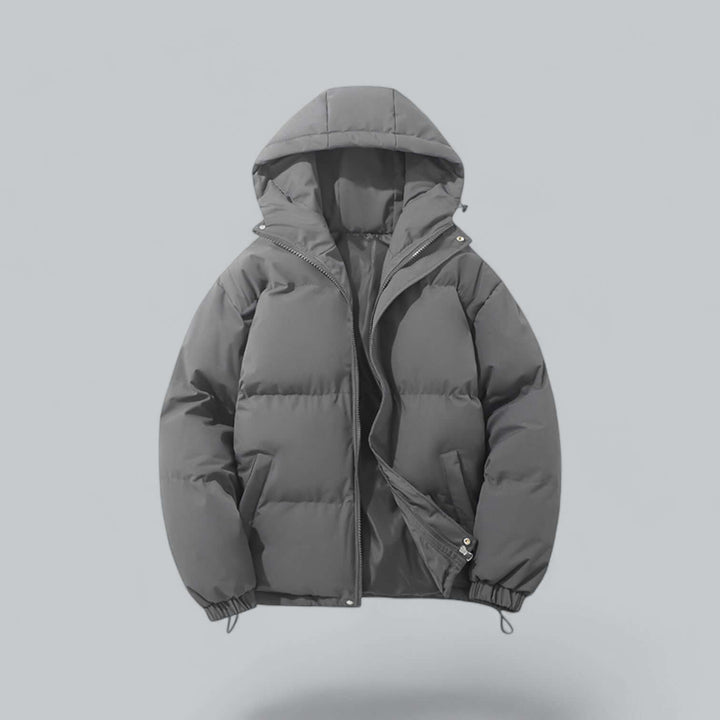 Modern men's winter coat, featuring an adjustable hood and superior insulation for cold.