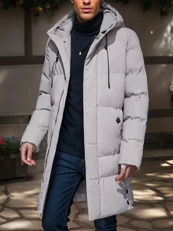 Stylish men's padded parka jacket, perfect for cold weather & outdoor adventures.