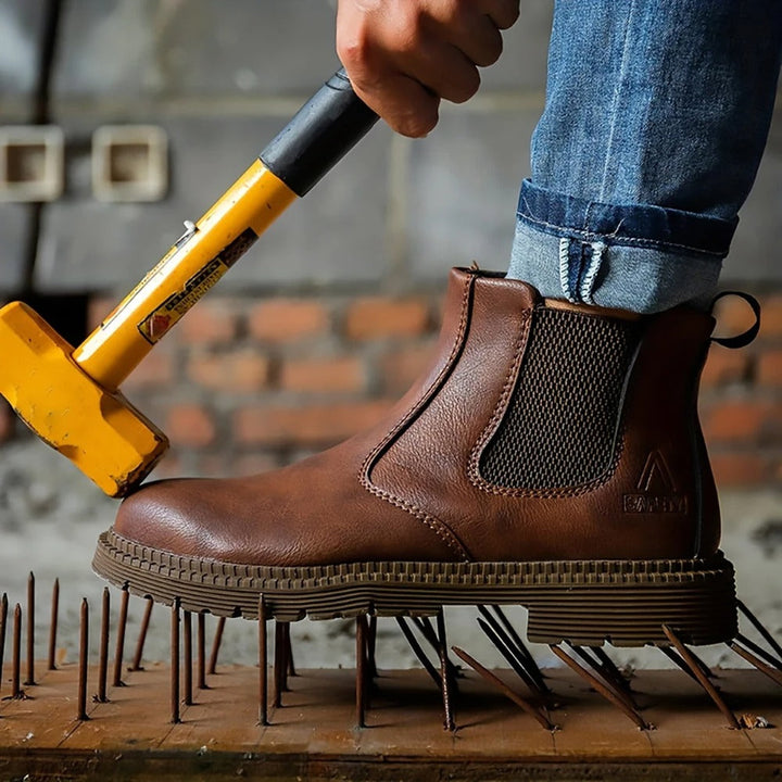 Waterproof steel toe safety shoes for men, robust and slip-resistant for demanding tasks.
