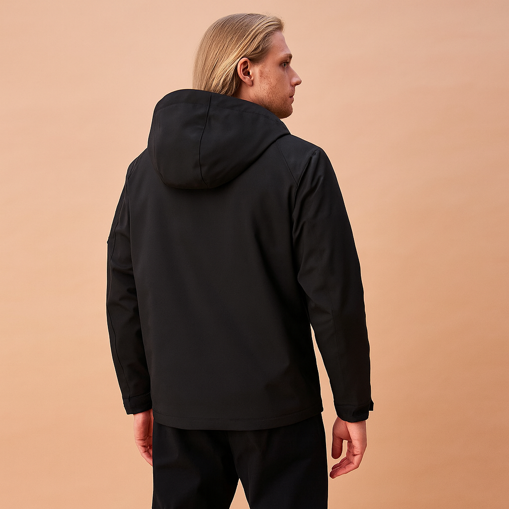 Men's adventure-ready tactical winter jacket, waterproof & hooded, perfect for cold, wet outdoor conditions & trekking.