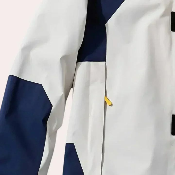 Durable men's hooded rain jacket, color block design. Weather-ready windbreaker for wet and transitional conditions.
