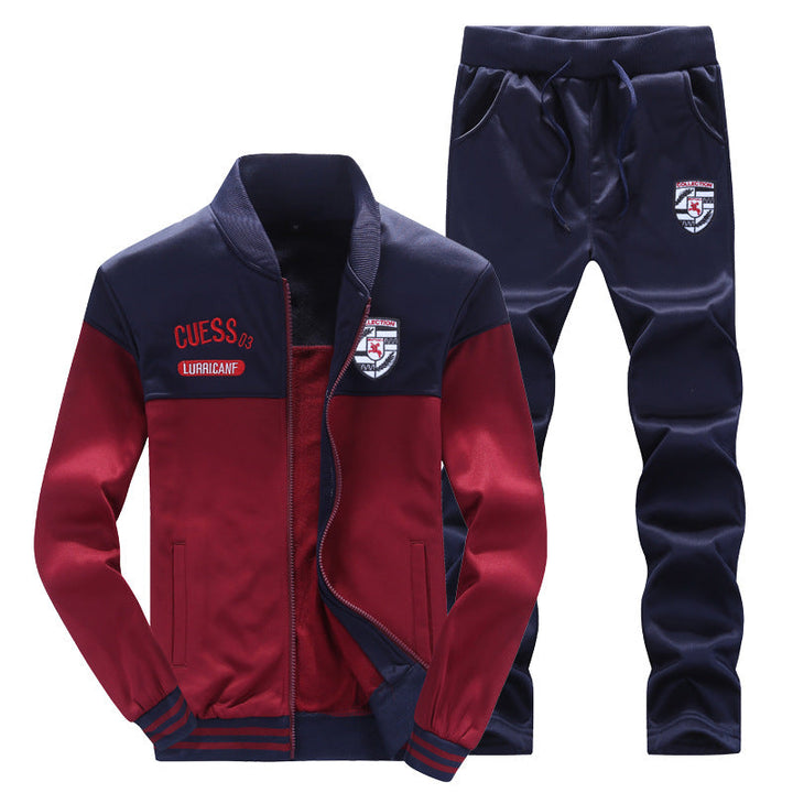 White and blue men's baseball style tracksuit. Sporty two-piece activewear set for casual or athletic fashion.