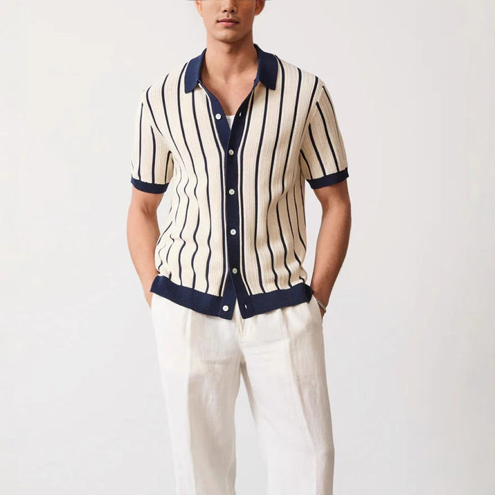 Men's smart casual short sleeve button-down shirt with a polo collar and vertical white stripes.