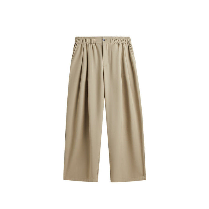 Men's pleated wide leg chino pants with a comfortable drawstring waist; ideal for stylish casual wear.