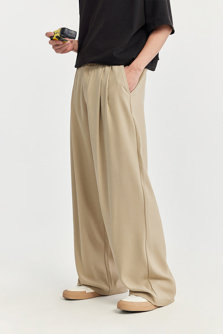 Men's casual chino wide leg pants with an elastic drawstring waist, ensuring all-day comfort & style.