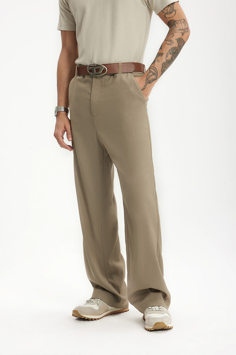 High-waisted men's wide leg trousers, tailored for a relaxed fit. Ideal for smart casual.