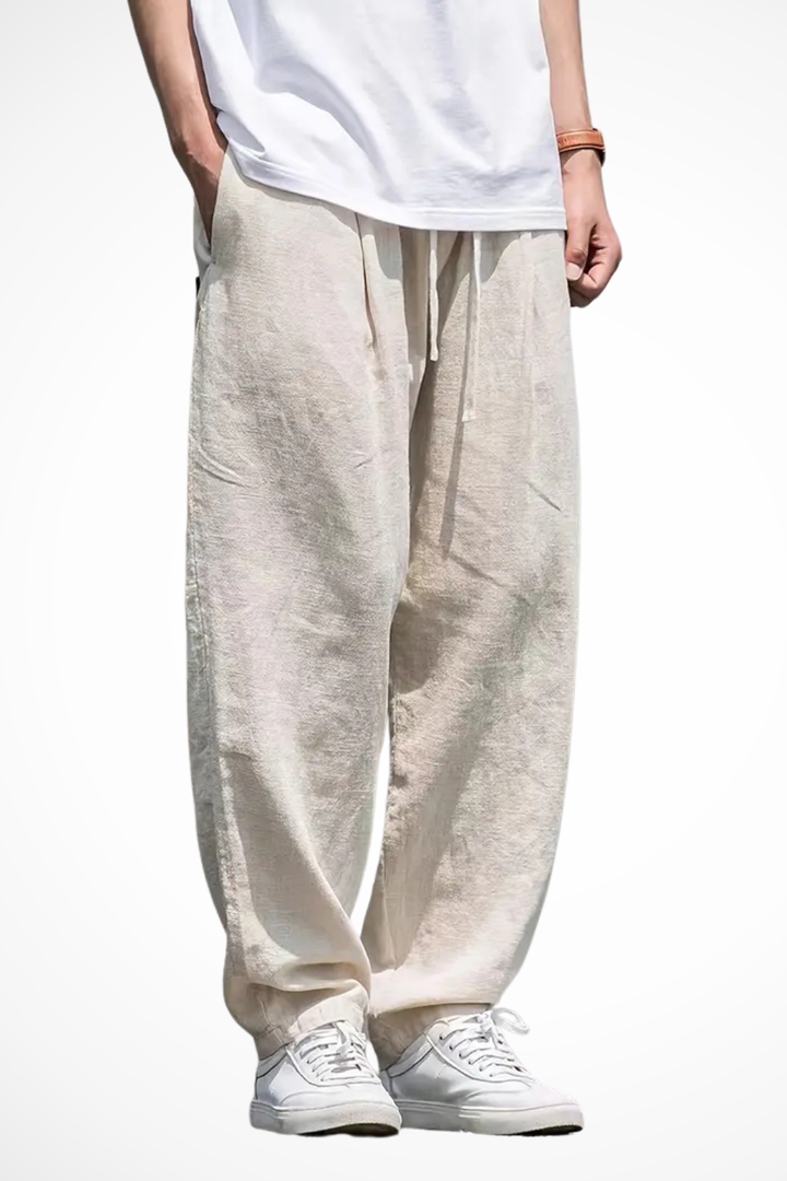 Men's wide leg khaki trousers with elastic waist & drawstring. Comfortable casual bottoms with front seam.