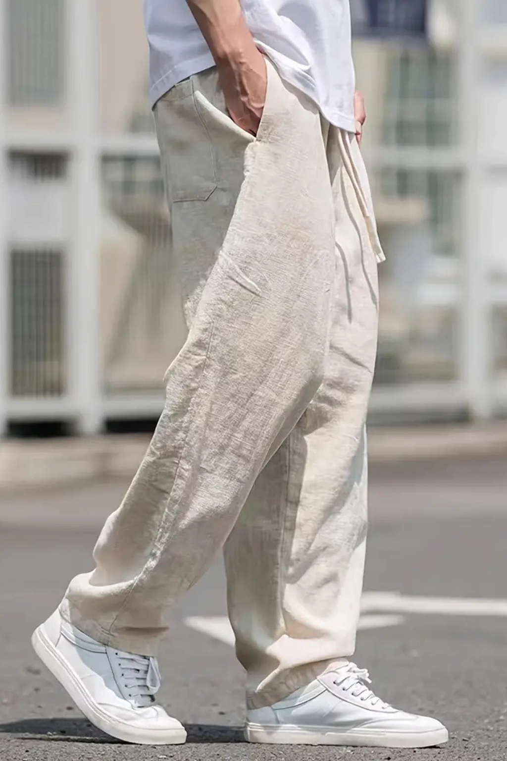 Khaki wide leg men's pants with elastic drawstring waist. Casual, comfortable bottoms with stylish front seam.