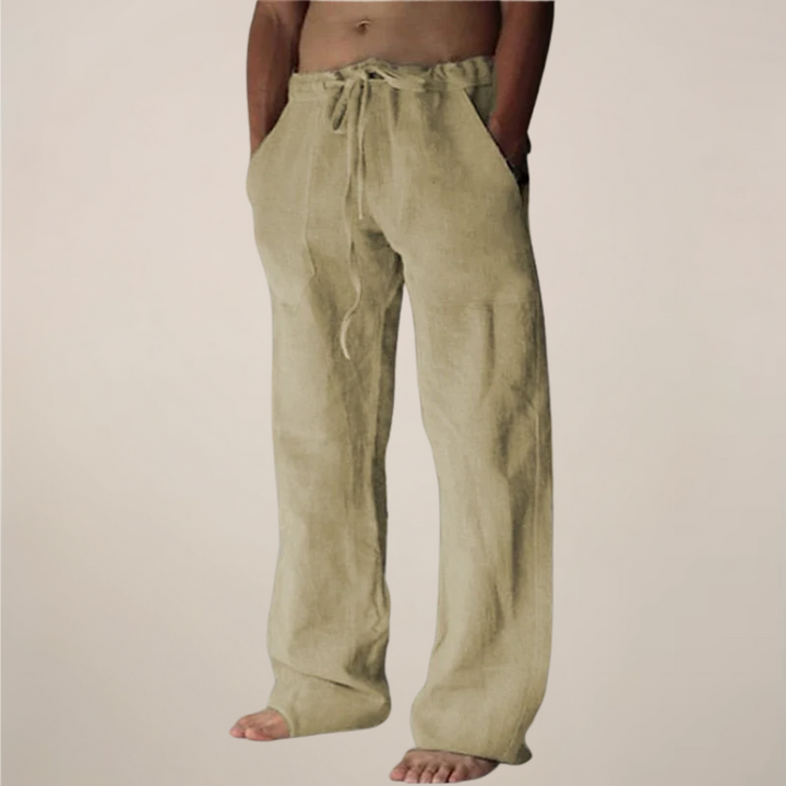 Men's wide leg relaxed fit trousers in navy blue, offering comfort and a casual summer look.