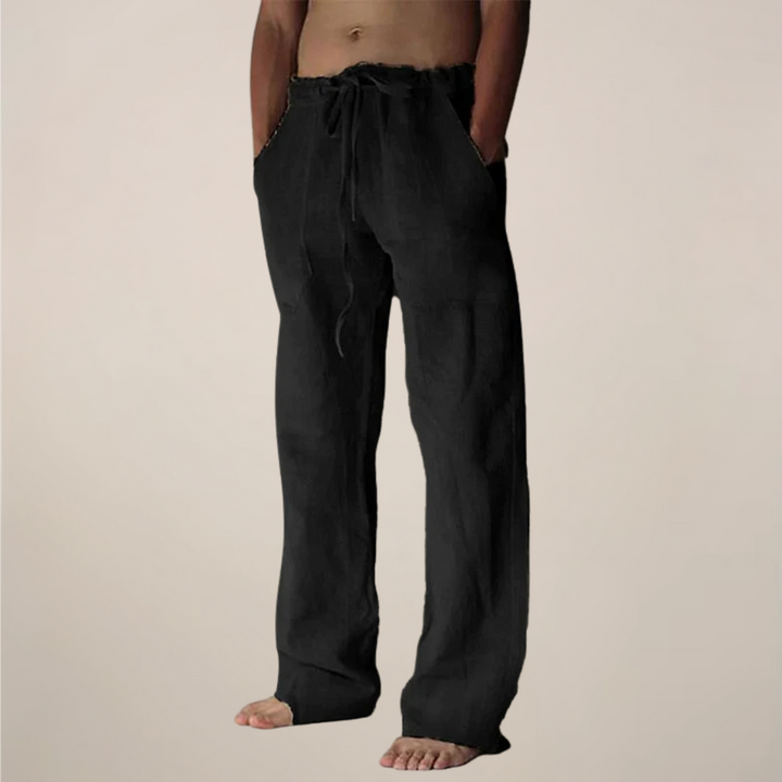 Side view of men's loose fit trousers in grey, showcasing wide leg style for mensfashion.
