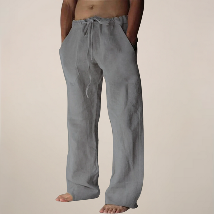 Men's wide leg relaxed fit trousers in white, a versatile addition to men's casualwear.