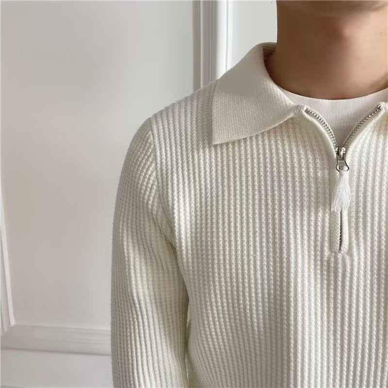 Men's long-sleeve knit sweater with a zip-up polo collar, blending casual comfort with smart style.